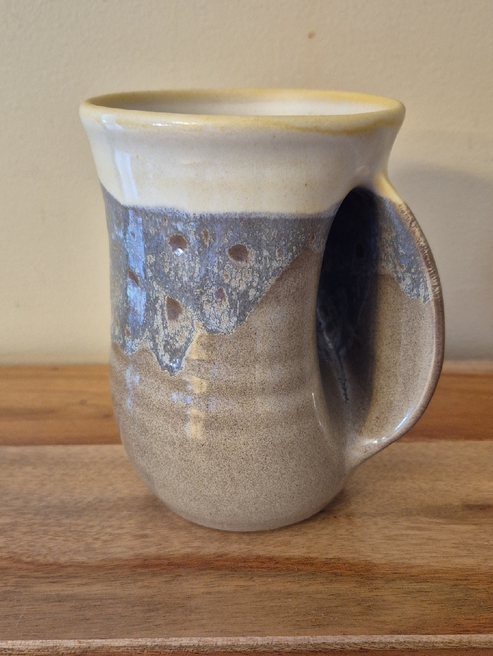 Handcrafted Neher Pottery Hand Warming Ceramic Mug in Cream and Blue
